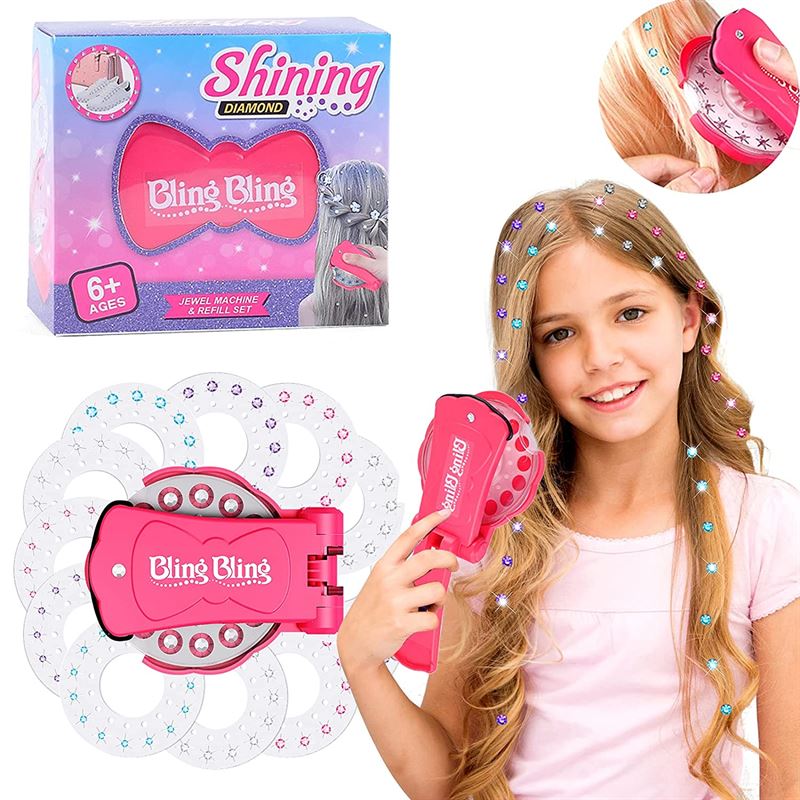 A young girl uses the Fashiongirl Bling Bling Ultimate Glam Kit—featuring 180 diamonds and a pink styling tool—to add sparkling stones to her hair. The product box and close-up of her bling accessories are shown. Great for ages 6+.