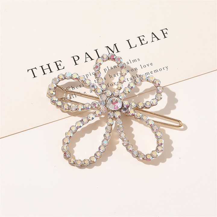 Chris Rubin Evie Hair Claw Gold - Fleur - Accessoires pour cheveux | Fashiongirl