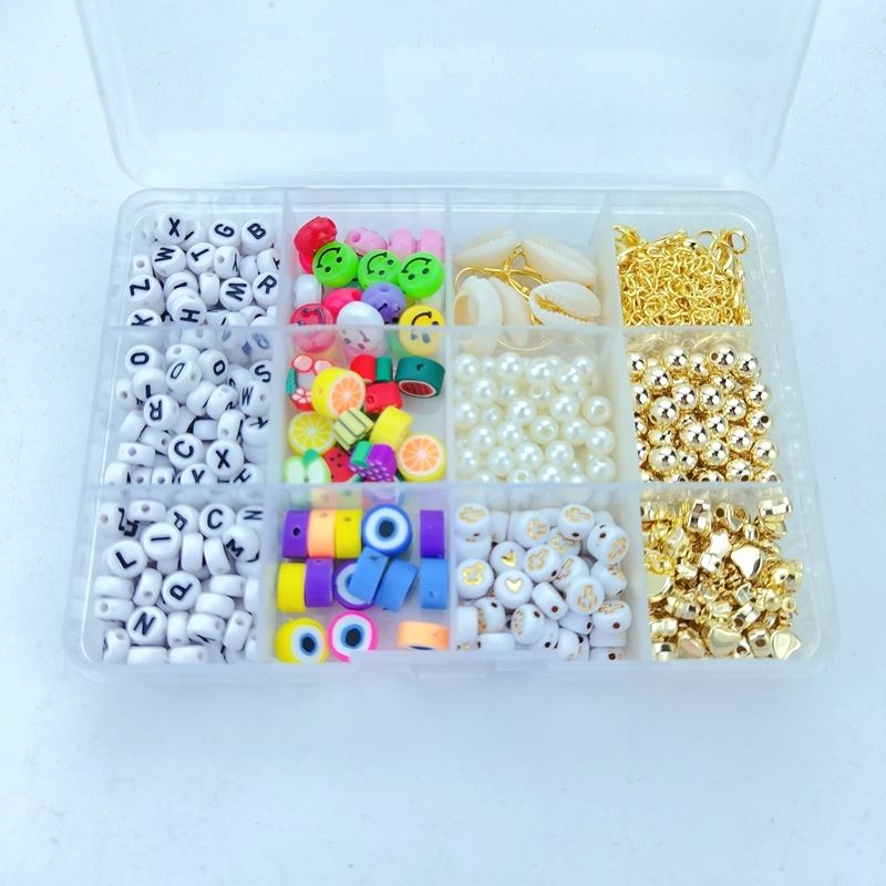 The Fashiongirl Clay Beads / Heishi Beads Arona Kit is a KREA DIY Jewellery Kit with 12,000 assorted beads, including letters, colorful rounds, pearls, fruit slice beads, metallic gold beads, and gold clasps in a 12-compartment organizer box.