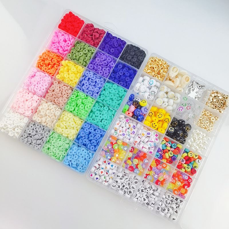 The Fashiongirl Clay Beads / Heishi Beads Merkki Kit by KREA is a 7000-piece DIY jewellery set, featuring solid round beads, alphabet beads, smiley faces, decorative and Heishi clay beads in a plastic organizer box with compartments.