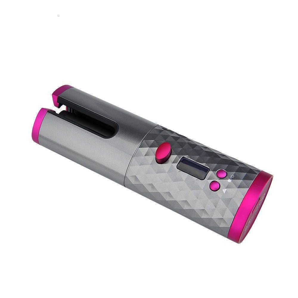 The Fashiongirl Cordless Automatic Hair Curler features a metallic gray, diamond-textured body with bright pink accents, side buttons, and a small digital display for effortless styling anywhere.