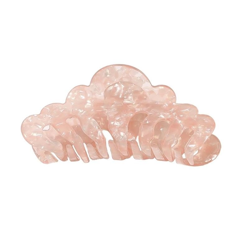 The SOHO Callie Hair Claw in Blush is a large, pink marble hair clip with a curved, cloud-like design and interlocking teeth, shown on a white background.