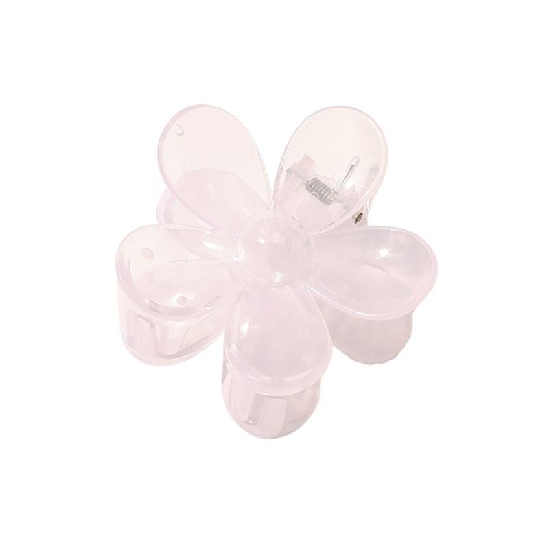 The SOHO Fiore Hair Claw in Pale Purple is a translucent, flower-shaped hair accessory with five rounded petals by SOHO, shown from above on a white background.