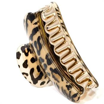 The SOHO Hair Claw - Leopard by SOHO is a large gold and black clip with a leopard motif, made of durable acrylic plastic and curved teeth for a secure grip.