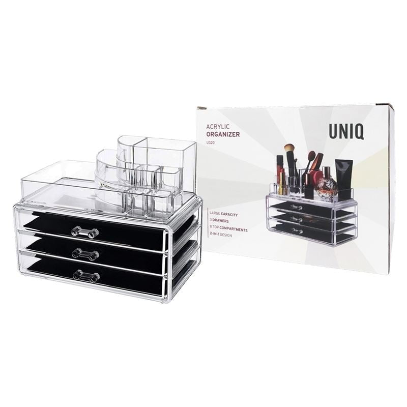 The UNIQ Make up organiser - 3 drawers SF-1303 (U320), a clear plastic organiser with multiple top compartments, is shown beside its box displaying the filled organiser and the UNIQ brand name.